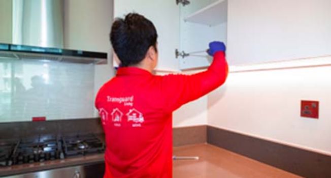 Cupboard hinge repair and handyman services by Transguard Living